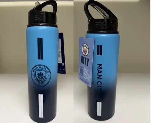 Eksempel på tilbagekaldt drikkedunk med "Manchester City" logo